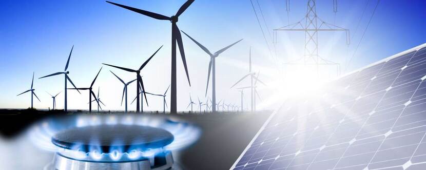 Windmolens, zonnepaneel en gasbrander